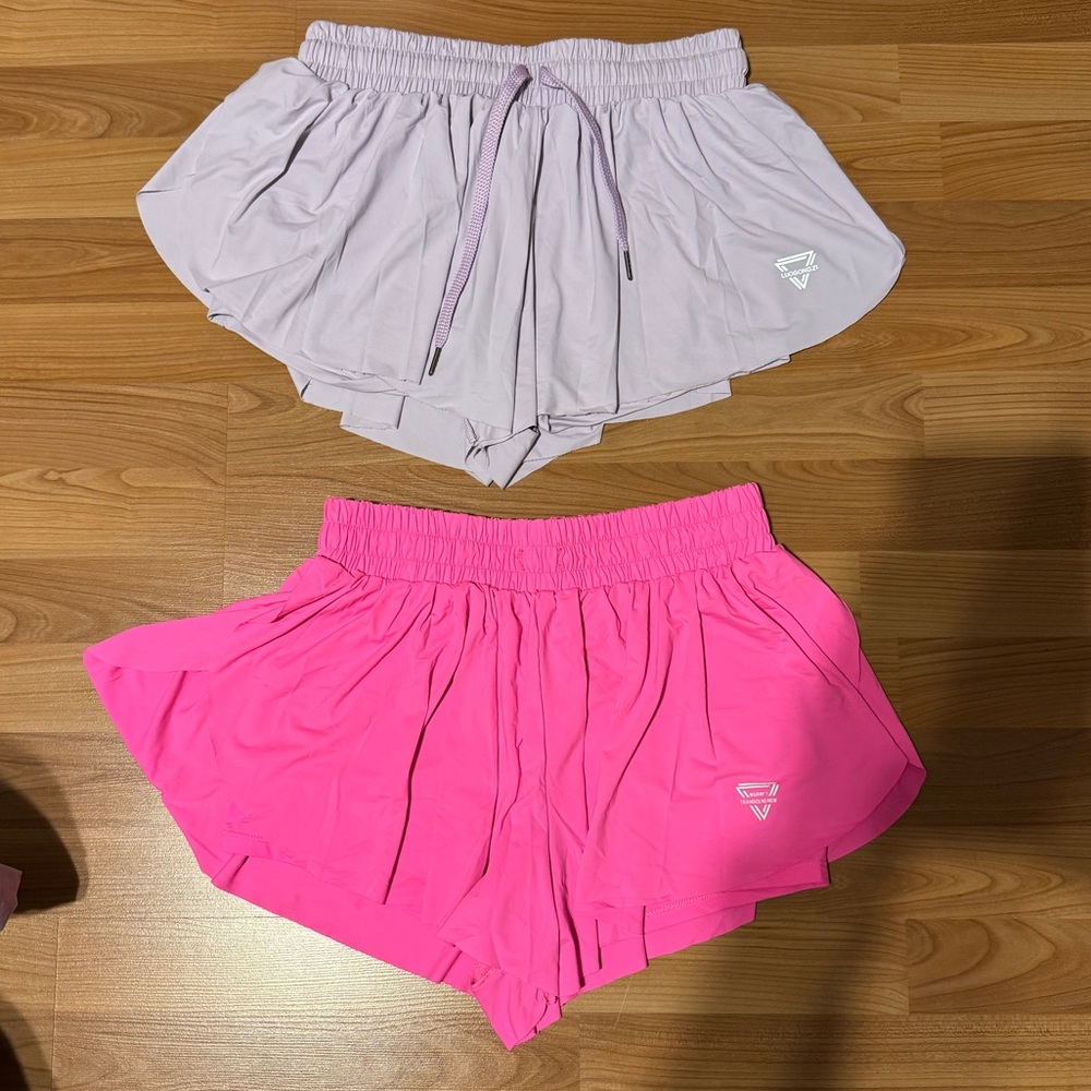 Vibrant Pink Wsirmet and Lavender Luogongzi Athletic Shorts $15 for both pair!